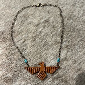 Brown Thunderbird Necklace with Turquoise Accents